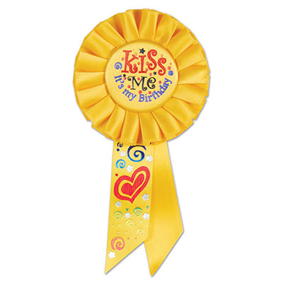 Kiss Me, It's My Birthday Yellow Rosette has multi colors of metallic lettering with heart/swirl designs