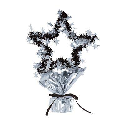 Metallic silver and black wired table centerpiece molded into the shape of a star and wrapped in black fringe and silver star embelishments. 