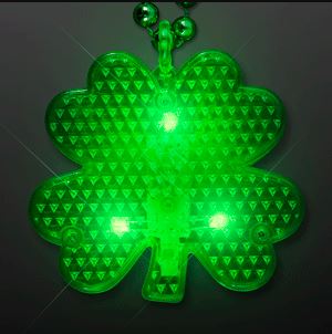 Flashing LED Shamrock Charm. This Flashing Shamrock Charm is the perfect addition to any St. Patrick's Day outfit.